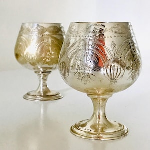 Two E.P.N.S. antique silver plated brandy goblets, 1920s England