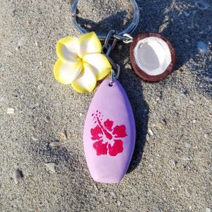 Hawaiian Summer Keychain - Surfboard with plumeria (frangipani) charms and half coconut