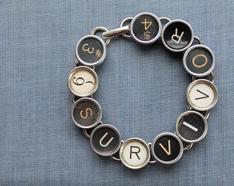 Embrace Resilience: Typewriter Key Bracelet with 'Survivor' Message