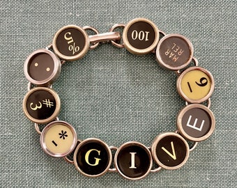 Elevate the art of gifting with our "GIVE" Typewriter Key Bracelet!