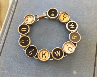 Charm Your Inner Bookworm: Unique Typewriter Key Bracelet Crafted from Upcycled Vintage Keys!