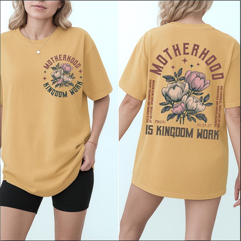 May include: Mustard yellow t-shirt with the words "MOTHERHOOD IS KINGDOM WORK" and a floral design on the front. The back of the shirt also features the words "MOTHERHOOD IS KINGDOM WORK" with a floral design and Bible verse.