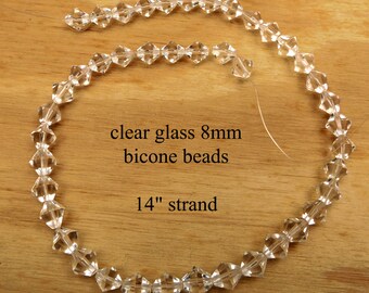 Crystal clear 8mm glass bicones in 14 inch strand, approx. 42 beads per strand, CLEARANCE sale