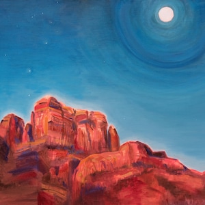 May include: A painting of a red rock formation under a bright blue sky with a full moon and stars. The moon is surrounded by a halo of light.