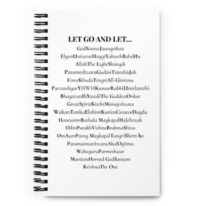 May include: A white notebook with a black spiral binding. The notebook has black text that reads "LET GO AND LET..." and lists various names of deities and spiritual figures from different religions and cultures.
