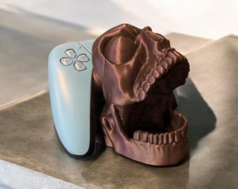 Screaming skull controller holder