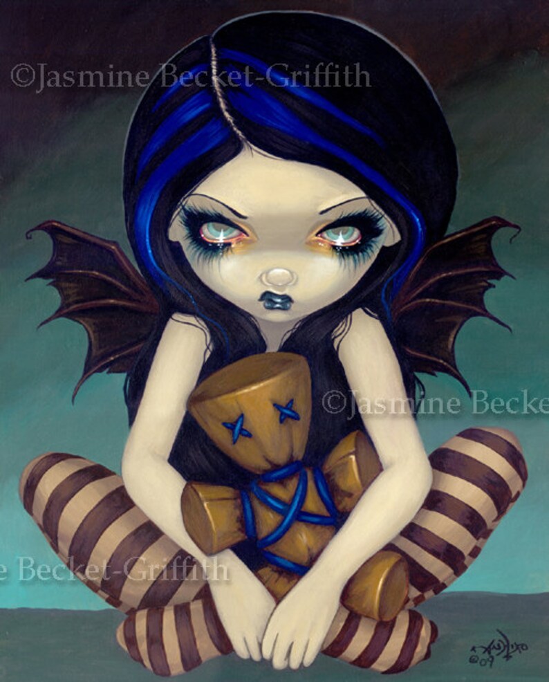 witch with voodoo doll