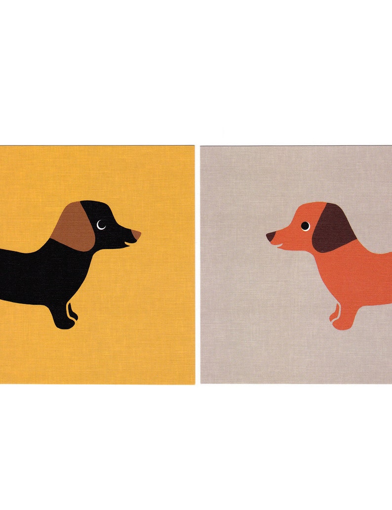 May include: Two illustrated dachshund dogs on separate cards. The dog on the left is black with brown ears and is on a yellow background. The dog on the right is orange with brown ears and is on a grey background.