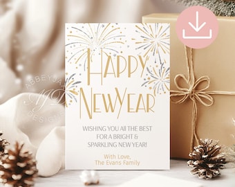 Peut inclure: Une carte de vœux rectangulaire blanche ornée d'illustrations de feux d'artifice dorés et argentés sur le dessus. Le texte indique Happy New Year, Wishing you all the best for a bright & sparkling New Year! With Love, The Evans Family en lettres dorées.