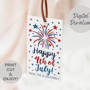 May include: A rectangular white gift tag with a brown leather string featuring red and blue firework illustrations and stars. The text reads Happy 4th of July! FROM, THE ALLEN FAMILY. The image includes Digital Download and PRINT CUT & ENJOY text.