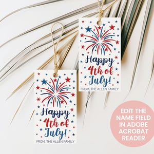 May include: Two rectangular white gift tags with jute twine loops, featuring red and blue firework illustrations and stars. The text reads "Happy 4th of July!" and "FROM, THE ALLEN FAMILY" in blue and red script and sans-serif fonts.