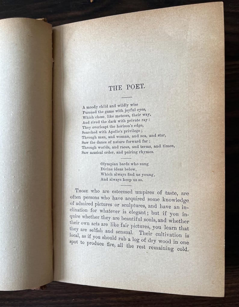 May include: A page from a vintage book with text about the poet. The text is in black ink on white paper. The text discusses the poet's journey and the importance of finding inspiration.