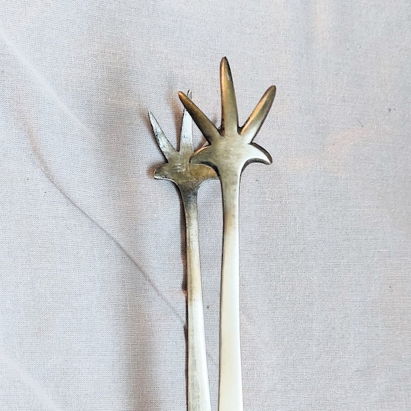 Silver bird's claws sugar tongs