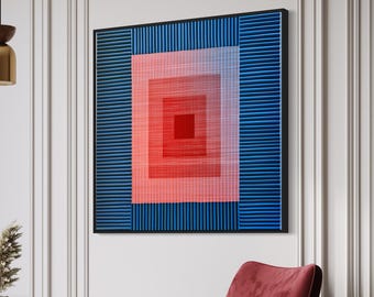 May include: A square wall art piece featuring a central red and pink gradient square pattern surrounded by vertical blue stripes, framed in black. The artwork displays a geometric composition with layered rectangular shapes and linear textures.