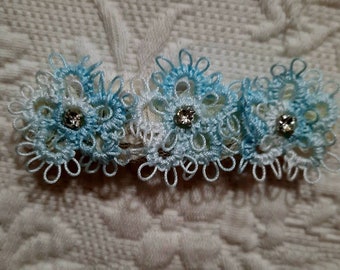 3-3/4" hair clips with handmade light blue variegated tatted flowers. You will receive these within 1 to 2 weeks.