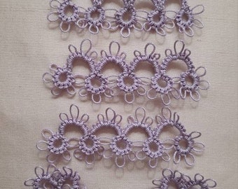 A set of 4 lavender tatted pieces and 3 tatted flowers to use as trim on ephemera.  You will receive these within 1 to 2 weeks.