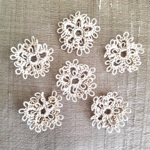 Hand tatted made-to-order lace flowers for your crafts.