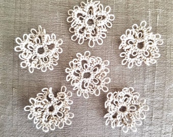 Hand tatted made-to-order lace flowers for your crafts.