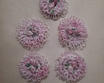 A set of five variegated pink and white flowers to use in crafts.