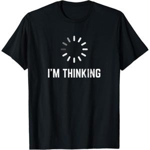 May include: Black t-shirt with the text "I'M THINKING" in white, above a loading circle graphic. The shirt is a classic crew neck style, made of a soft material.