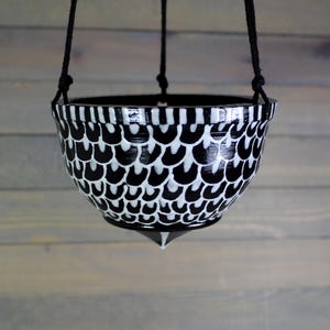 May include: A handmade wooden sign with the text "Welcome" in a playful font. The sign features a distressed white background and a dark brown border, perfect for a front door or entryway. Measures approximately 12 inches wide.