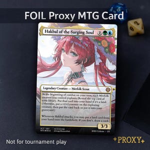 May include: Foil proxy MTG card featuring Hakbal of the Surging Soul, a Legendary Merfolk Scout. The card art depicts a woman with red hair and floral accents. The card has a 3/3 power and toughness. Text at the bottom reads "Not for tournament play."