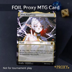 May include: A foil proxy MTG card featuring an anime-style illustration of a character with white hair and blue eyes. The card is labeled "Misty Rainforest" and includes game text. The bottom of the card reads "Not for tournament play."