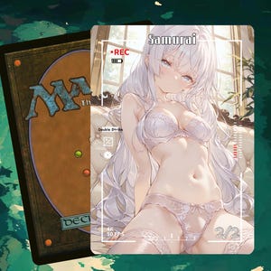 May include: A Magic: The Gathering card with an anime-style illustration of a woman in lingerie. The card is labelled "Samurai" and includes the text "Double Strike" and "2/2". The card is set against a green and brown background.