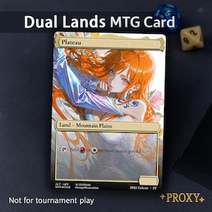 May include: A custom MTG card featuring an anime-style illustration of a woman with orange hair. The card is labeled "Plateau" and "Land - Mountain Plains." Text at the bottom reads "Not for tournament play." Dice are visible in the background.
