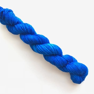TRUE BLUE hand dyed yarn mini skein. sock fingering dk yarn, merino wool knitting embroidery. sock mini 4 ply. semi-solid blue yarn image 1