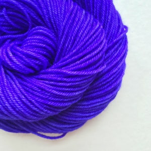 DEEP VIOLET hand dyed yarn fingering sock dk bulky yarn super wash merino wool yarn single or ply. choose your base. dark violet purple yarn image 1