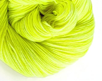 VOLTAGE yellow hand dyed yarn fingering sock dk bulky yarn super wash merino wool yarn single or ply. you choose your base. neon yellow yarn