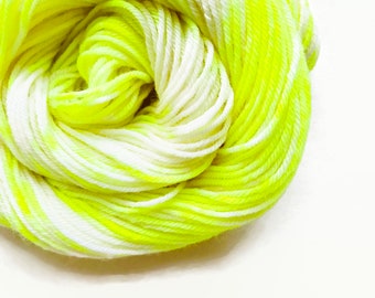 VOLT LIGHT hand dyed yarn speckle. choose your base from fingering, sock, dk, or bulky yarn. white cream neon yellow yarn speckle yarn