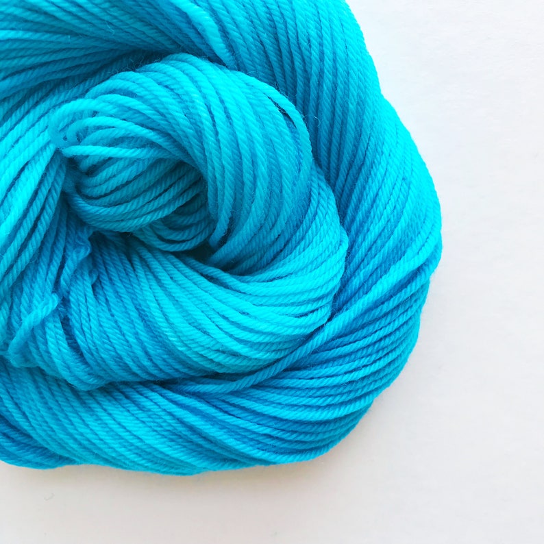 REEF ENCOUNTER hand dyed yarn fingering sock dk bulky yarn merino wool yarn single or ply. choose your base. light turquoise blue yarn image 1