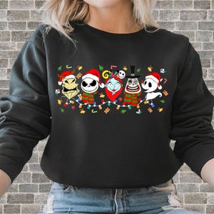 Graphic T-shirt design printed on unisex apparel – available as T-shirt, hoodie, sweatshirt and romper. High-quality DTF print. Perfect for gifts, family shirts, matching outfits, friends tees. Christmas The Nightmare Before Christmas Characters