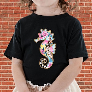 Graphic T-shirt design printed on unisex apparel – available as T-shirt, hoodie, sweatshirt and romper. High-quality DTF print. Perfect for gifts, family shirts, matching outfits, friends tees. The Little Mermaid