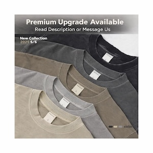 Stacked neutral-color t-shirts shown as an example of our premium blank option. Premium upgrade available—see description or message us.
Pop culture graphic tshirt with funny quote/character-style print, unisex premium cotton tee, viral meme gift idea, perfect for fans, birthday or holiday present, casual streetwear, great for matching outfits, available in multiple sizes.