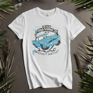 T-shirt effetto used con cappuccio e scritta Finn Mcmissile Secret Agent per uomo, donna e bambino - Taglie dalla S alla 5XL / T-shirt e felpa con cappuccio da donna disponibili AD845