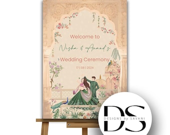 以下が含まれることがあります： 木製のイーゼルに立てられた結婚式の案内板。 「Welcome to Nisha & Anand's Wedding Ceremony」の文字と日付17|08|2024が記され、クリーム色の背景に花柄と建築イラストが描かれています。