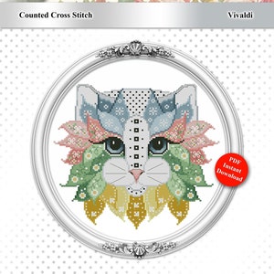 May include: A counted cross stitch pattern featuring a colorful cat with flowers and leaves around its face. The pattern is titled "Colorful Cats" and "Vivaldi".