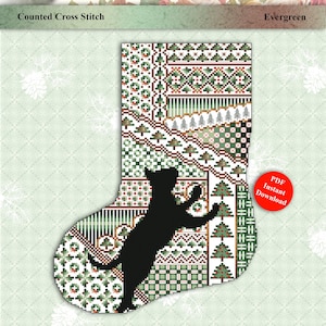 May include: A counted cross stitch pattern for a Christmas stocking featuring a black cat climbing a tree. The stocking is decorated with a patchwork of green, red, and white festive patterns. The pattern is titled "Cats and Stockings" and is available as an instant PDF download.