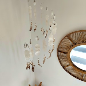 mother-of-pearl suspension
