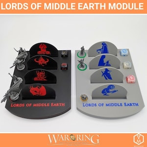 May include: Two game modules, one black and one gray, with the text "LORDS OF MIDDLE EARTH". The black module has red graphics and the gray module has blue graphics. Dice and miniature figures are included. The modules are designed for a tabletop game.