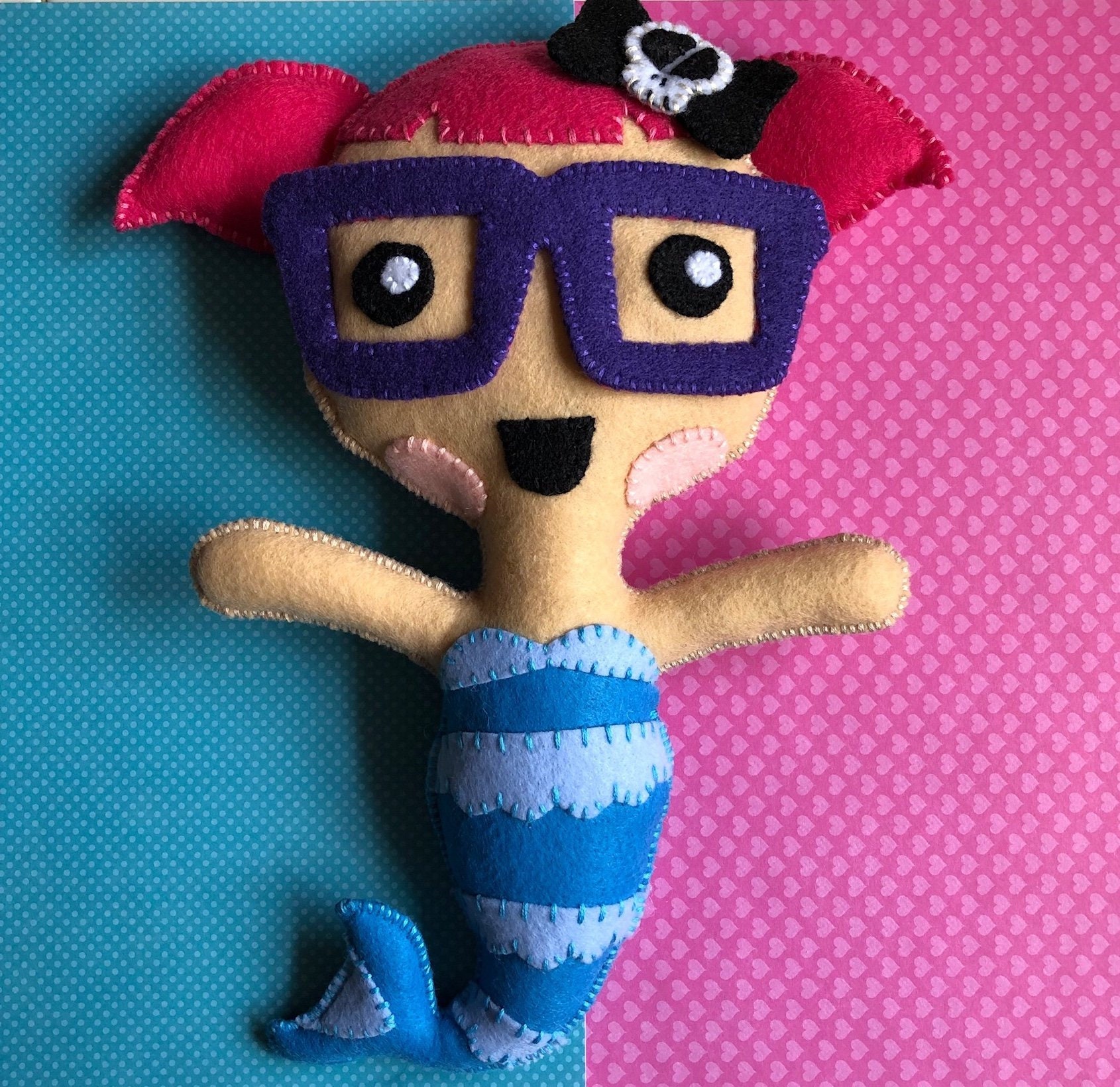 soft doll with glasses