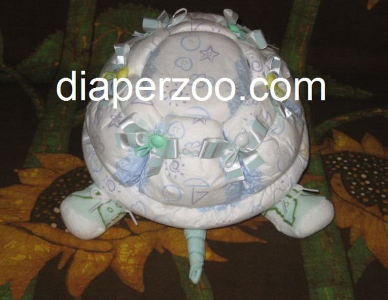 Learn how to make Scooter the Diaper Turtle. GR8 for baby nursery. Diaper cake keepsake image 3