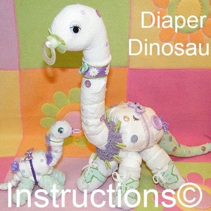DIY Learn how to make these Diaper Dinosaurs. Instructions for great baby gift, diaper cake. How to...