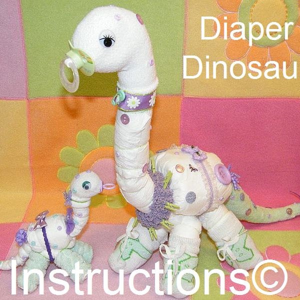 DIY Learn how to make these Diaper Dinosaurs. Instructions for great baby gift, diaper cake. How to...