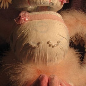 Learn how to make an ANGEL from diapers and baby items. Heavenly INSTRUCTIONS. GR8 baby shower gift. image 3