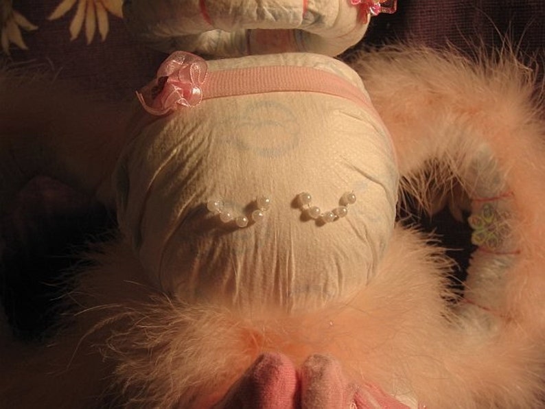 Learn how to make an ANGEL from diapers and baby items. Heavenly INSTRUCTIONS. GR8 baby shower gift. image 3