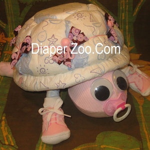 Learn how to make Scooter the Diaper Turtle. GR8 for baby nursery. Diaper cake keepsake image 2